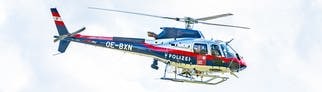 Ein Hubschrauber der österreichischen Polizei in der Luft