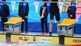 Tapper und Schwimmer bei einer Parasport-Veranstaltung