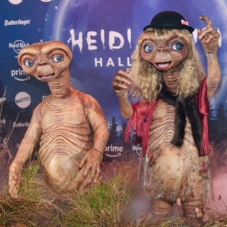 Tom Kaulitz (links) und Heidi Klum als E.T. an Halloween verkleidet