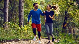 Optimistische Paare motivieren sich zum Sport