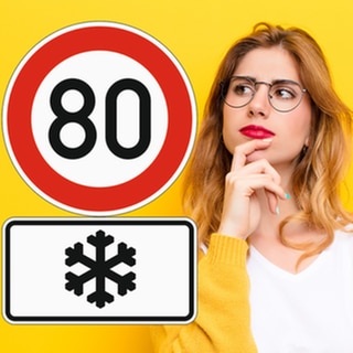 Frau schaut nachdenkend auf Verkehrszeichen mit Schneeflocke und Tempo 80. Gilt das Schild nur im Winter?