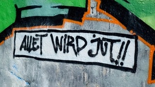 Graffiti mit der Aufschrift Allet wird Jut. Symbolbild für Artikel zum Thema: Warum wir Dialekt sprechen, aber selten schreiben.