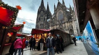 Show-Taschendieb Giovanni auf einem Weihnachtsmarkt. Tipps um sich vor Diebstahl auf dem Weihnachtsmarkt zu schützen.