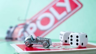 Spielfigur zum Gewinnen des Brettspiels Monopoly mit diesen Tricks