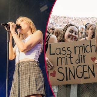Lea steht am Mikrofon und Fan Hannah zeigt ein Plakat mit der Aufschrift: „Lass mich mit dir singen“