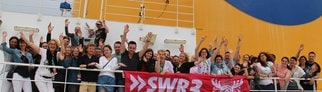 Gewinnergruppe auf dem Schiff