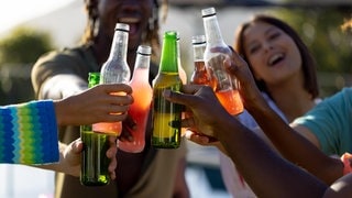 Happy diverse group of friends having party