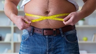 The fat obese man in dieting concept