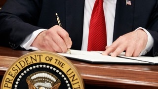 President Donald Trump signs an executive order on health care in the Roosevelt Room of the White House, Thursday, Oct. 12, 2017, in Washington. (AP PhotoEvan Vucci)