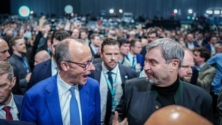 Friedrich Merz (l), Kanzlerkandidat der Union und CDU Bundesvorsitzender