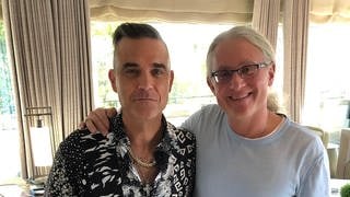 Robbie Williams und SWR3-Redakteur Matthias Kugler