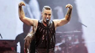 Robbie Williams singend