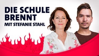 Stefanie Stahl und Bob Blume vor Flammen