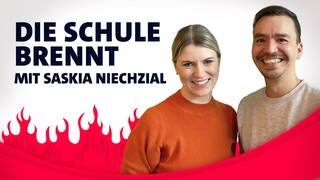 Saskia Niechzial und Bob Blume vor Flammen
