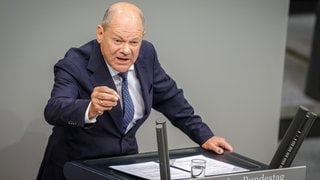 Scholz lernt auf den Tisch zu hauen